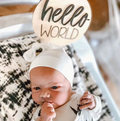 Hello World round wood plaque announcement